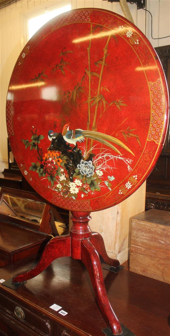 Red lacquer painted and decorated circular tea table